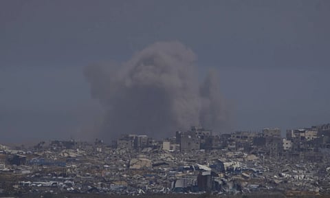Smoke rises to the sky in the Gaza strip as seen from southern Israel (AP)