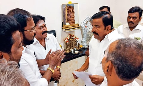 Minister for Municipal Administration, Urban and Water Supply KN Nehru interacts with traders in Tiruchy on Wednesday