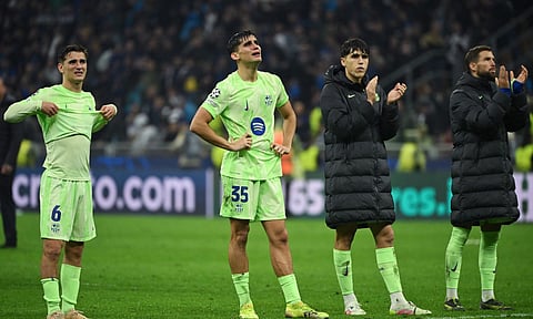 Barcelona players cut dejected figures after the loss to Inter Milan