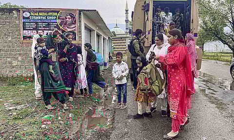 People from border areas shift to safer place following shelling by Pakistani troops, at Mendhar in Poonch, Friday, May 9 (PTI) 