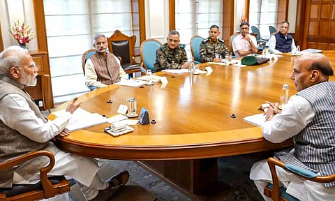 Prime Minister Narendra Modi and other officials during a high level meeting, in New Delhi (PTI) 