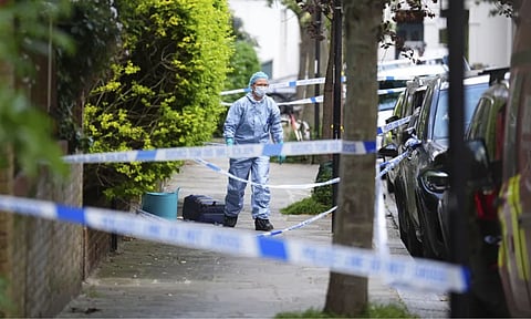 A police cordon is seen in Kentish Town, near British Prime Minister Keir Starmer's house in North London (AP)