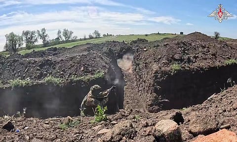 This photo taken from video distributed by Russian Defense Ministry Press Service on Monday, May 12, 2025, Russian servicemen attend a combat training for assault units in an undisclosed location in Ukraine. (AP)