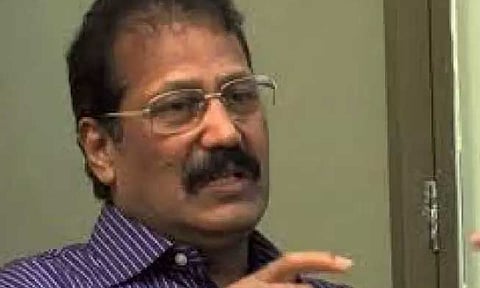 Dr K Krisnasamy 