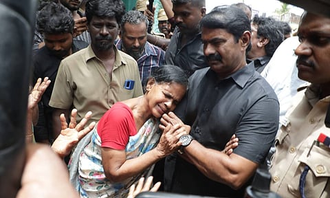 NTK chief coordinator Seeman with residents of Anakaputhur, protesting against eviction drive, on Wednesday