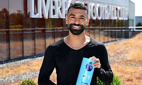 Mohamed Salah with the Premier League award 