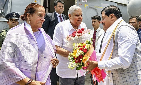 Vice President Jagdeep Dhankhar with wife Sudesh Dhankhar being welcomed by Madhya Pradesh Chief Minister Mohan Yadav, upon their arrival in Narsinghpur, Madhya Pradesh (PTI) 