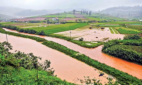 A flooded Motorai Palada village near Ooty in Tuesday