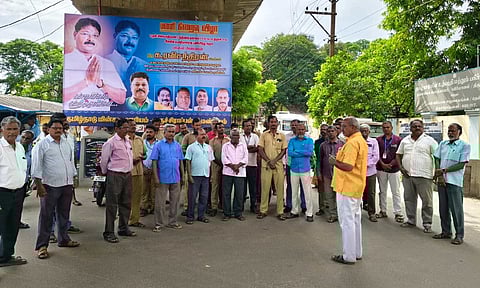 Tangedco employees in Tiruchy staged a protest on Thursday