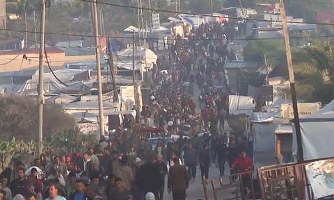 The Gaza Humanitarian Foundation 's distribution of aid has been marred by chaos, and multiple witnesses have said Israeli troops fired on crowds near the delivery sites. (Credit: AP)