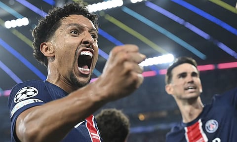 PSG's Marquinhos celebrates during the Champions League final soccer match between Paris Saint Germain and Inter Milan, at the Allianz Arena in Munich, Germany, Saturday, May 31, 2025 (AP) 