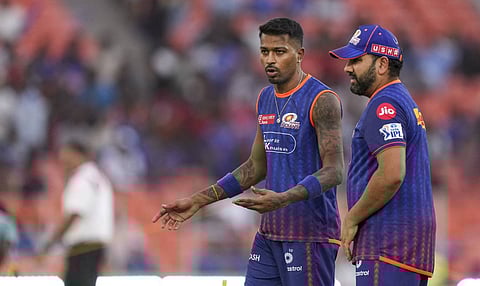 Mumbai Indians' captain Hardik Pandya and Rohit Sharma before an Indian Premier League (IPL) 2025 Qualifier 2 T20 cricket match between Mumbai Indians and Punjab Kings, at the Narendra Modi Stadium, in Ahmedabad, Sunday, June 1, 2025 (PTI) 