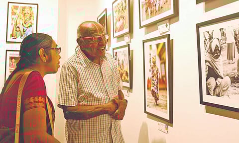 Visitors admiring the photographs showcased at Confluence, Photographic Society of Madras’s exhibition at Lalit Kala Akademi (Photo: Thabin Sakthinesh M) 
