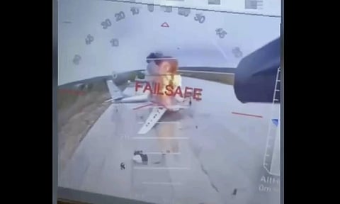 In this image taken from video released June 1, 2025, by a source in the Ukrainian Security Service shows a Ukrainian drone striking Russian planes deep in Russia's territory (AP)