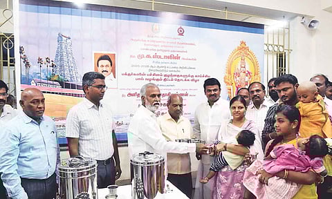 HR&CE Minister PK Sekarbabu launching hot milk scheme at Tiruchendur Subramania Swamy Temple on Monday