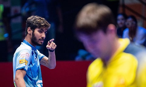 Ankur Bhattacharjee celebrates after his win