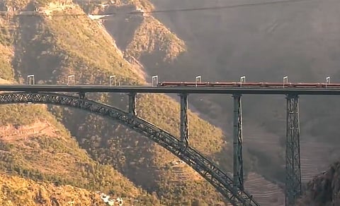 A Vande Bharat Express train on the Chenab Rail Bridge, in Jammu & Kashmir (PTI)