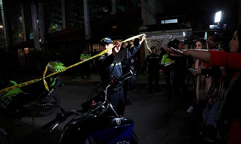 Police officers cordon off the area where Colombian Senator Miguel Uribe Turbay of the opposition Democratic Center party, was shot during a campaign event, in Bogota, Colombia, June 7, 2025. | Photo Credit: Reuters