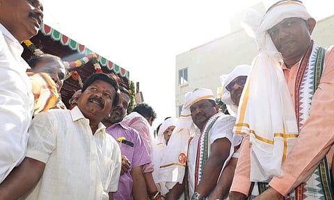 State Minister Sivasankar and devotees pull the new temple car 