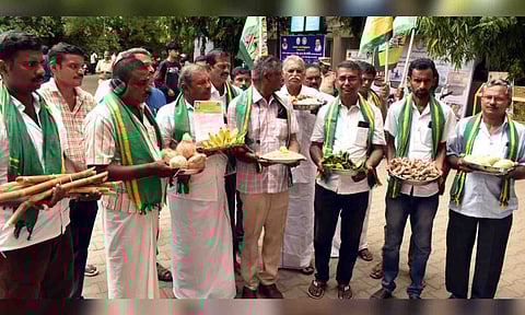 Farmers approaching Erode collector to withdraw the mandatory CIBIL score to avail crop loans, on Monday