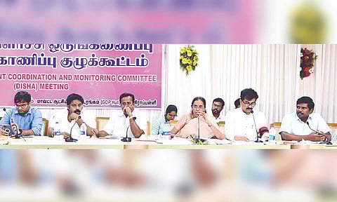 Dignitaries at the district development coordination and monitoring meeting in Tiruchy on Tuesday