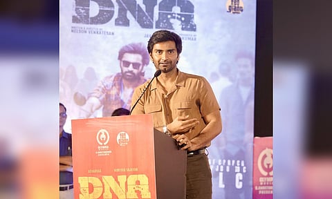 Actor Atharvaa Murali on stage during DNA movie promotion (Photo: X@proyuvraaj)