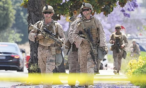 U.S Marines work outside of a federal building in Los Angeles, (AP)