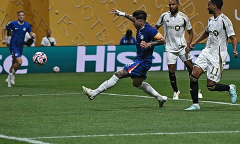 Enzo Fernandez kicks to score Chelsea's second goal