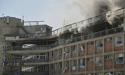 Separate Iranian strikes also hit a high-rise apartment building in Tel Aviv and other sites in central Israel. Authorities in Israel said at least 40 people were wounded (AP) 