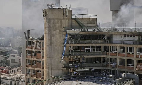 Iranian missiles hit a major hospital in southern Israel and struck residential buildings in Tel Aviv (AP)