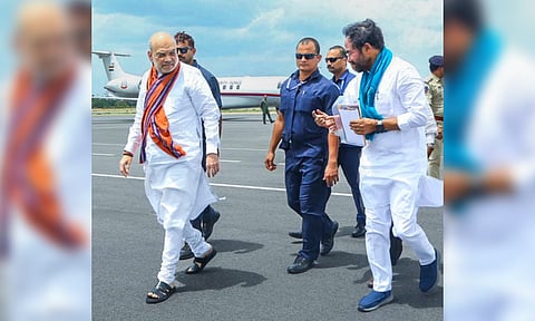 Union Home Minister Amit Shah being received by Union Minister and Telangana BJP President G. Kishan Reddy upon his arrival in Hyderabad.