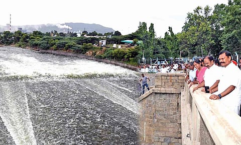 State Tourism Minister R Rajendran, Salem Collector R Brindha Devi, and Salem MP Selvaganapathy, after opening sluices of the Ellis Saddle