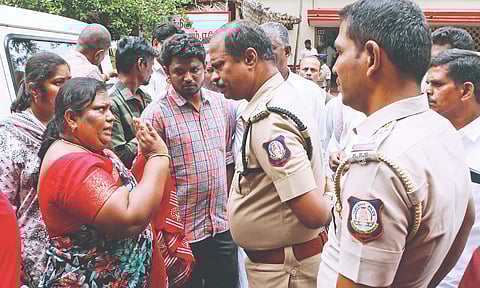 Relatives of deceased Adithya arguing with police