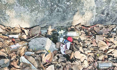Empty liquor bottles scattered across Kotturpuram railway station depicts a shoddy story