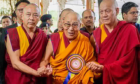 Tibetan spiritual leader the Dalai Lama with others during the celebration of his 90th birthday, at Tsuglagkhang, the main Dalai Lama temple, McLeodganj, in Kangra district, Himachal Pradesh, Sunday, July 6, 2025 (PTI) 
