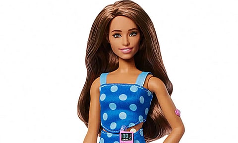Enhancing Inclusivity: A new Barbie wears blue polka-dots, glucose monitor