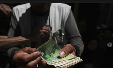 Cash is the lifeblood of the Gaza Strip’s shattered economy, and like all other necessities in this war-torn territory -- food, fuel, medicine -- it is in extremely short supply (AP)
