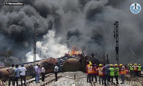 Thick black smoke from burning wagons billows into the sky near Tiruvallur railway station on Sunday; firefighters battled 10 hours to douse the blaze (Photo: Hemanathan M) 