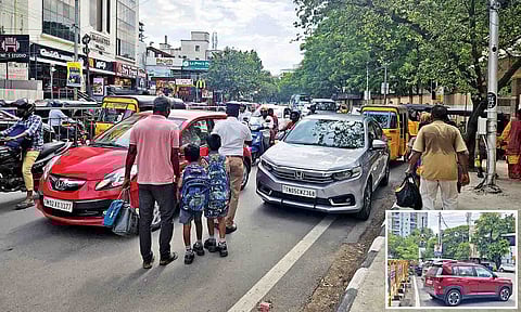 Traffic congestion on Kilpauk Garden Road in the evening as cars and auto being parked