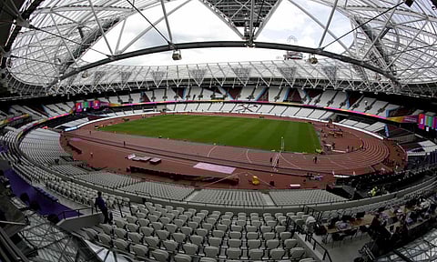 Workers continue setup preparations ahead of the start of the World Athletics Championships at the London Stadium, in the Queen Elizabeth Olympic Park in London, Aug. 1, 2017. (AP) 