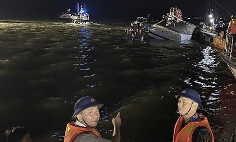 Tourist boat capsizes during thunderstorm in Vietnam, leaving 34 dead; 8 people remain missing (AP)