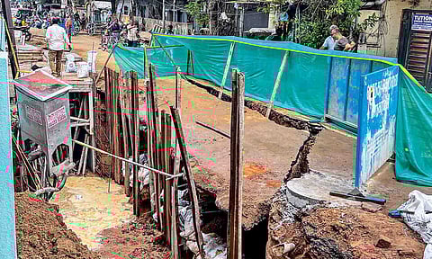 The cave-in after the SWD works at Bajanai Koli Main Road 