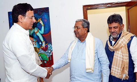 In this image posted by @siddaramaiah via X on July 24, 2025, Karnataka Chief Minister Siddaramaiah with Deputy CM DK Shivakumar during a meeting with AICC General Secretary Randeep Singh Surjewala, in New Delhi (PTI)