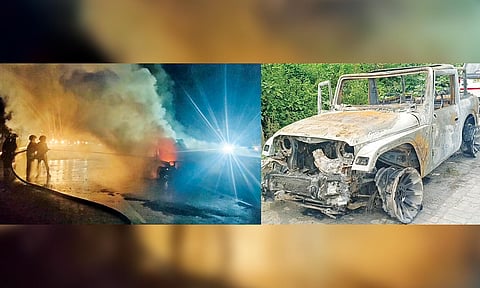 Fire Service personnel dousing the fire that gutted the vehicle (above) while it was proceeding on the national highway