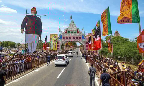 Supporters during a roadshow of Prime Minister Narendra Modi, at Gangaikonda Cholapuram, in Ariyalur district of Tamil Nadu (PTI)
