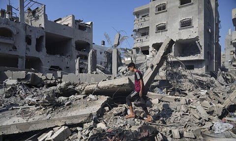 Desperate search for survivors in Gaza residential building hit by an Israeli airstrike (AP)