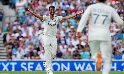 India's Prasidh Krishna celebrates after taking the wicket of England's Jamie Overton during the second day of the fifth Test cricket match between India and England, at The Oval, in London, Friday, Aug. 1, 2025