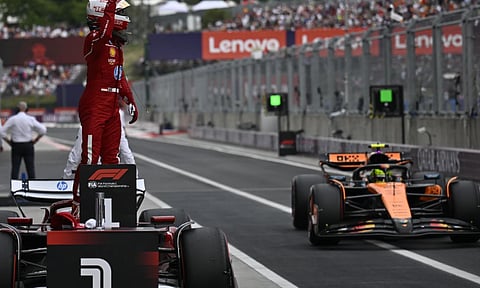 Ferrari driver Charles Leclerc of Monaco celebrates his pole position after the qualifying session for the Hungarian Formula One Grand Prix at the Hungaroring racetrack in Mogyorod, Hungary, Saturday, Aug. 2, 2025 (AP)