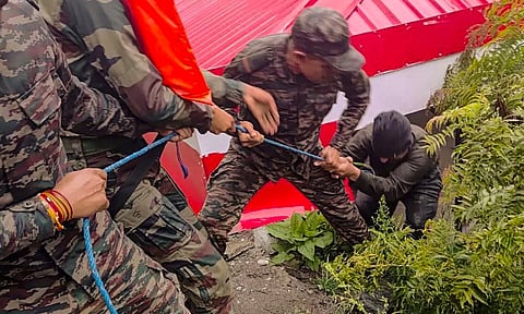 Rescue operation underway following mudslides and flash floods triggered by a cloudburst at Kheer Gad area in Dharali of Uttarkashi district (PTI)