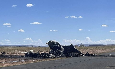 This image released by the Navajo Nation Police Department shows a medical transport plane after it crashed near the airport in Chinle (AP)